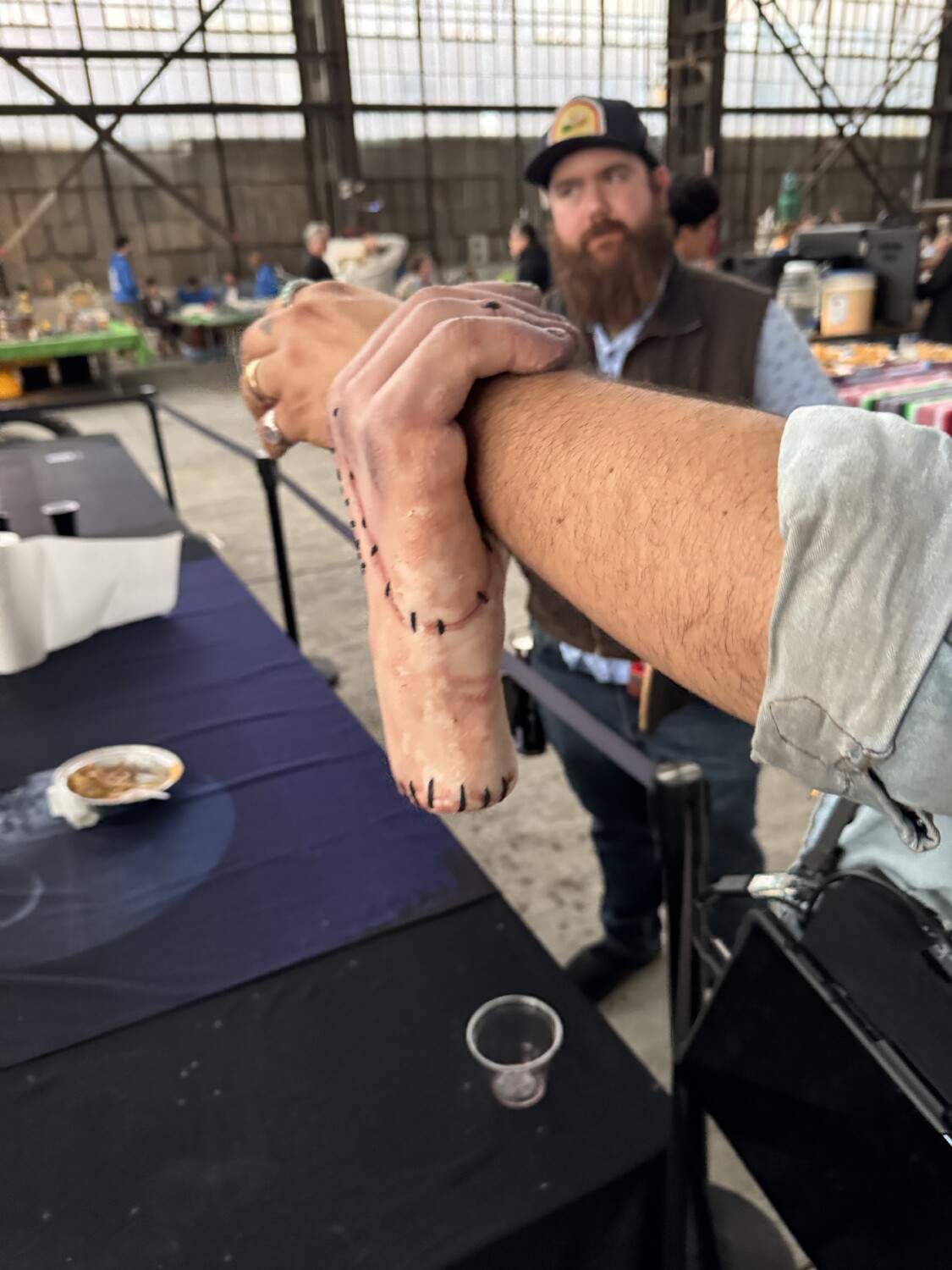 The Thing hand from Wednesday grabbing an arm
