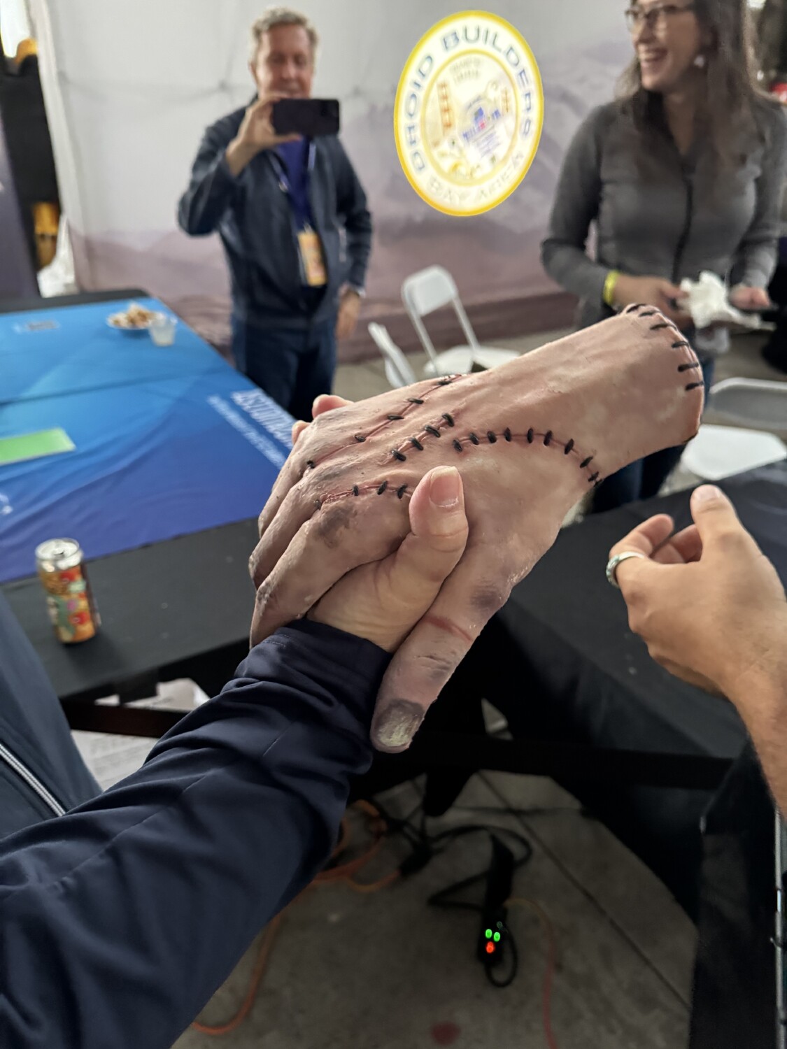 Raptor House FX team with Thing hand prop