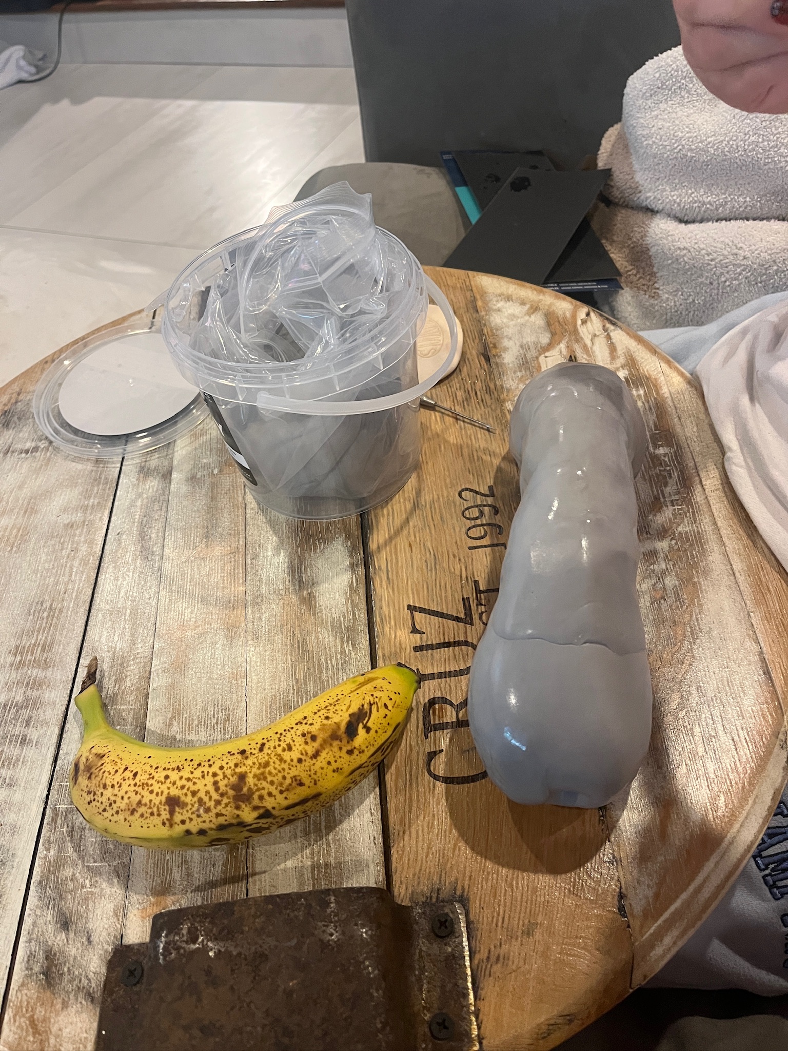 Real banana next to the clay mold for reference