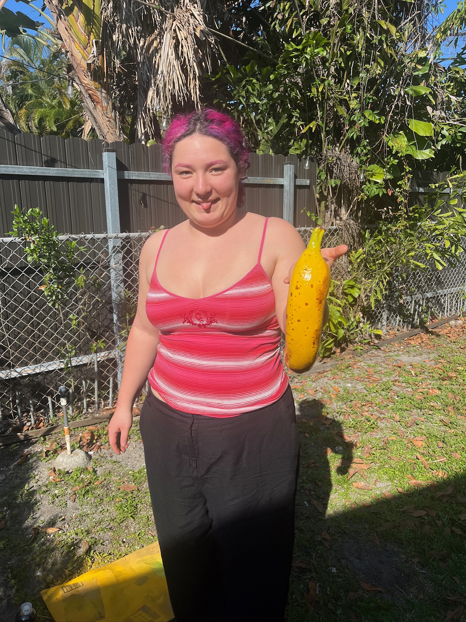 Holding the finished painted banana handset