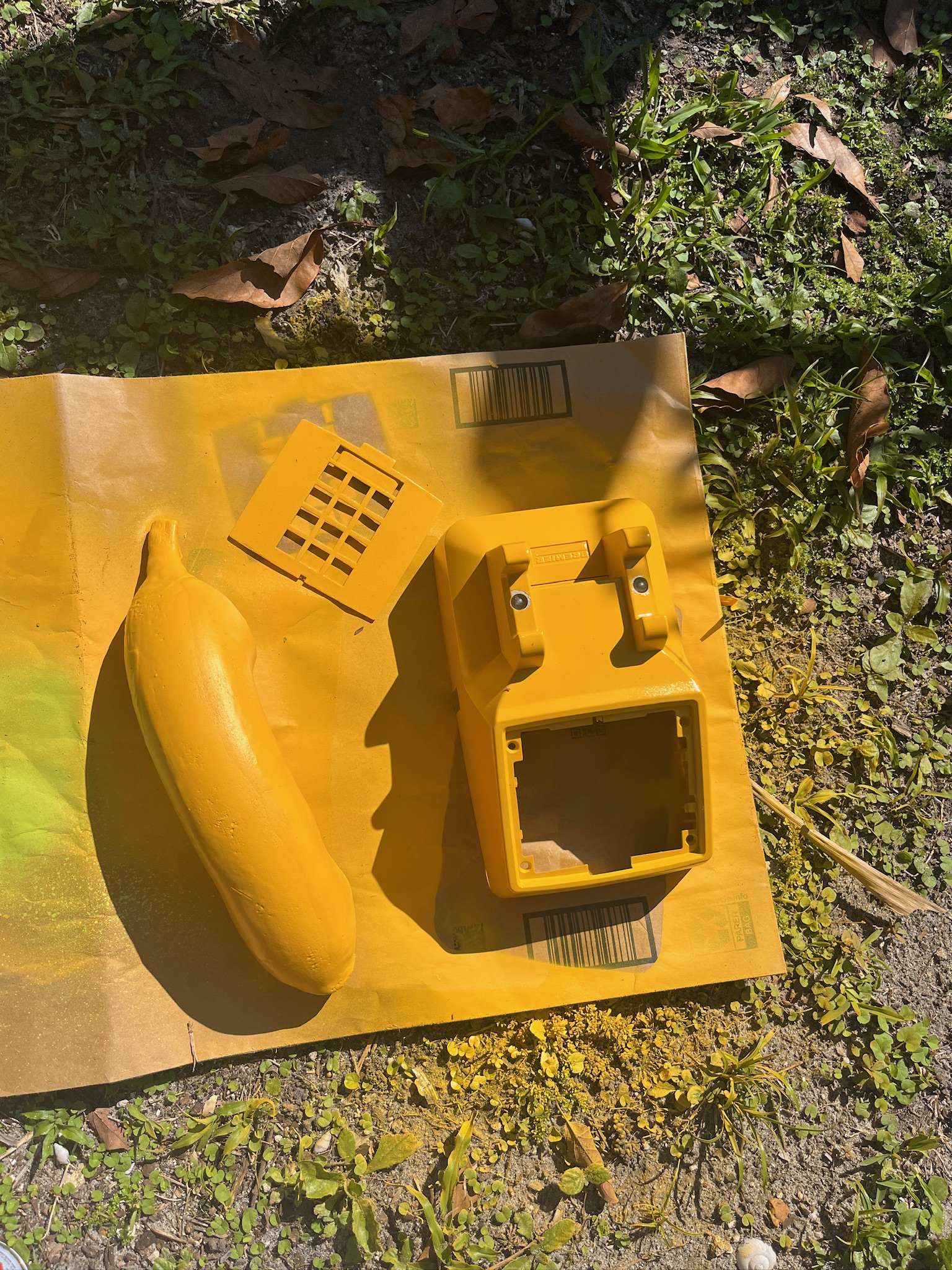 All phone parts spray painted banana yellow