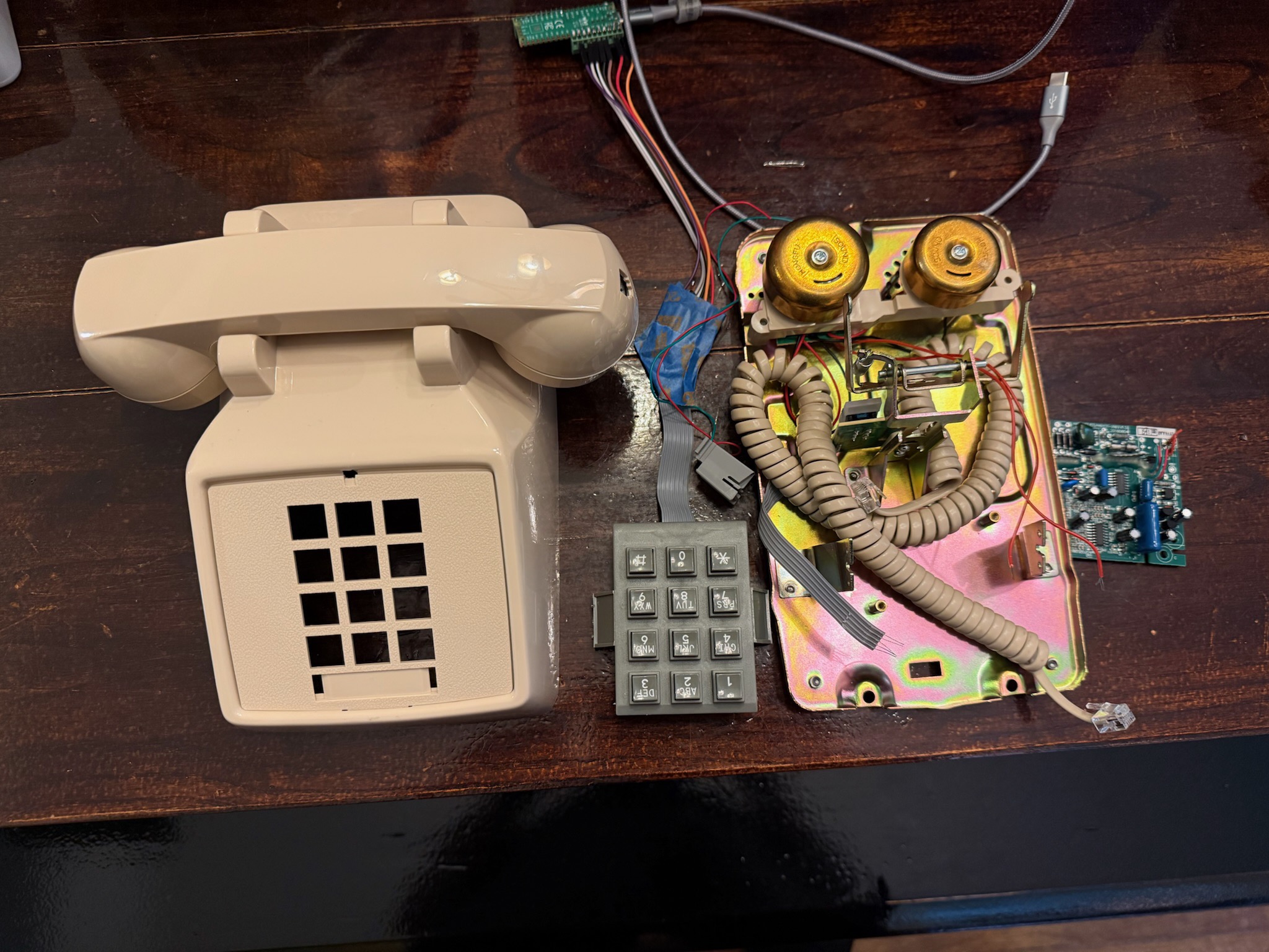 Phone teardown showing original internals and handset